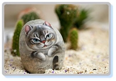 Рисунки кошек на камнях 5